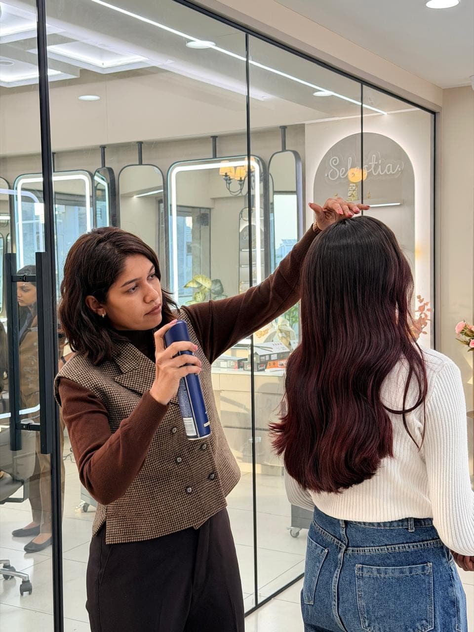 Vidhi finishing a fresh blow-out at the atelier