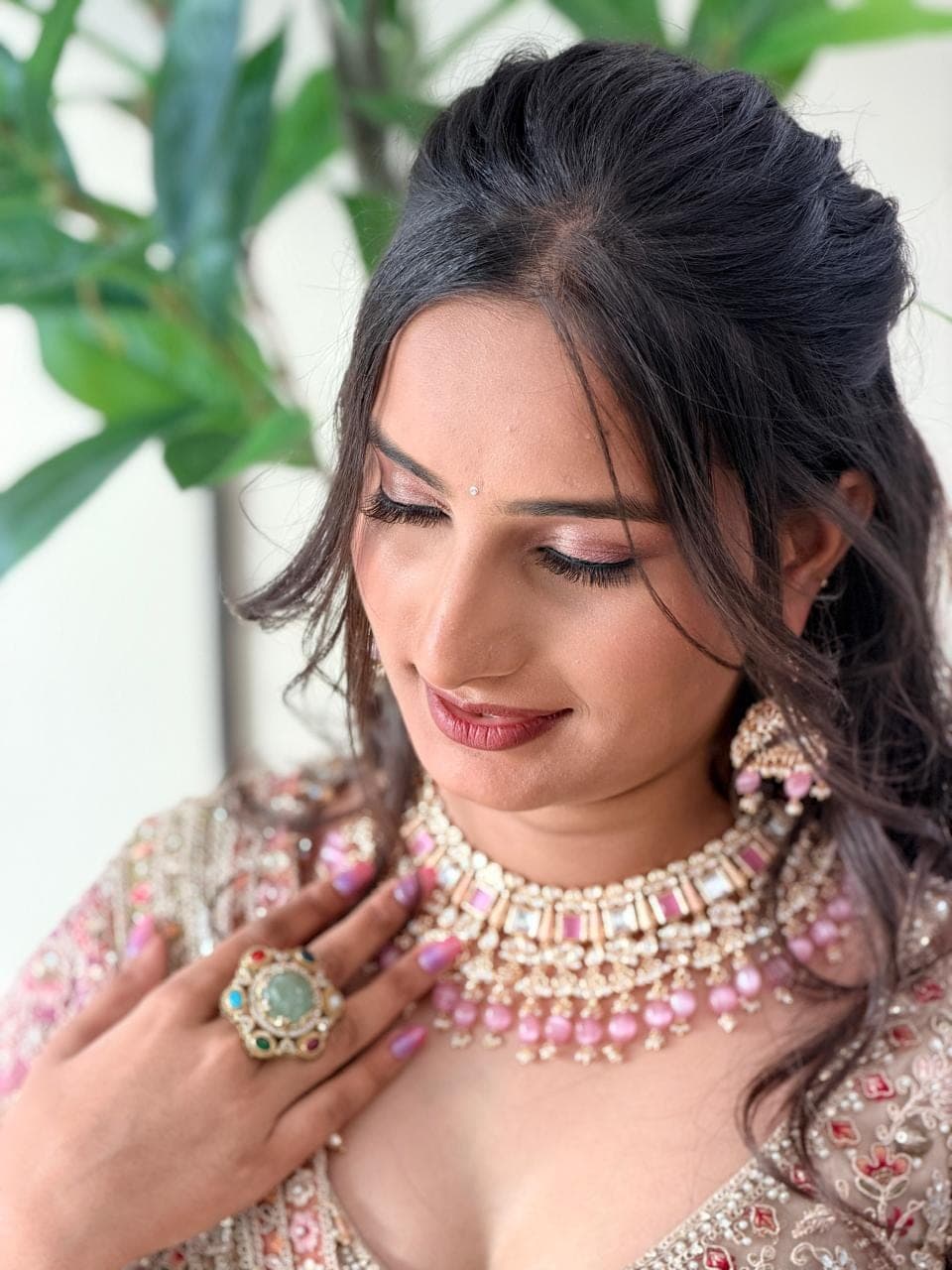 Dewy soft-glam make-up with pink jewellery