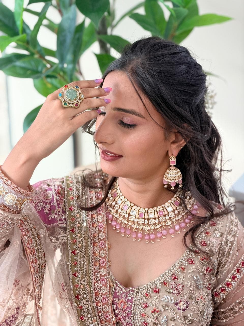 Champagne bridal glam with emerald ring