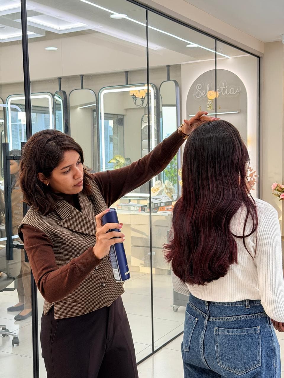 Vidhi — founder & master stylist, at the chair