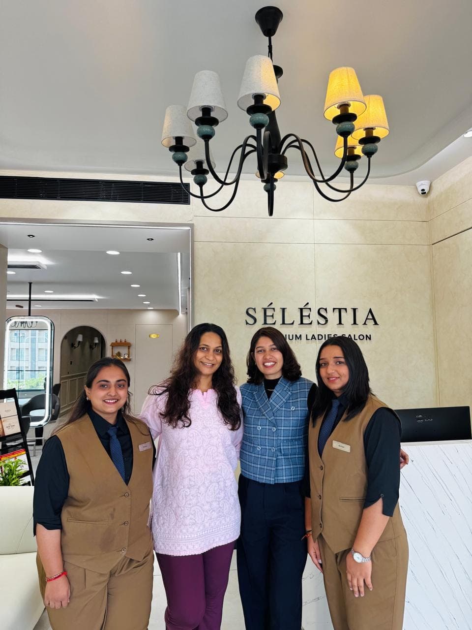 The Sélestia team beneath the wordmark